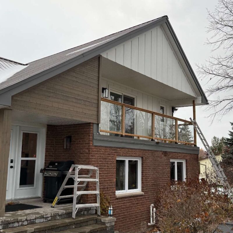 Home demolition and LP Smartside Board & Batten installation project in Maitland (near Brockville) by Country Home Exteriors